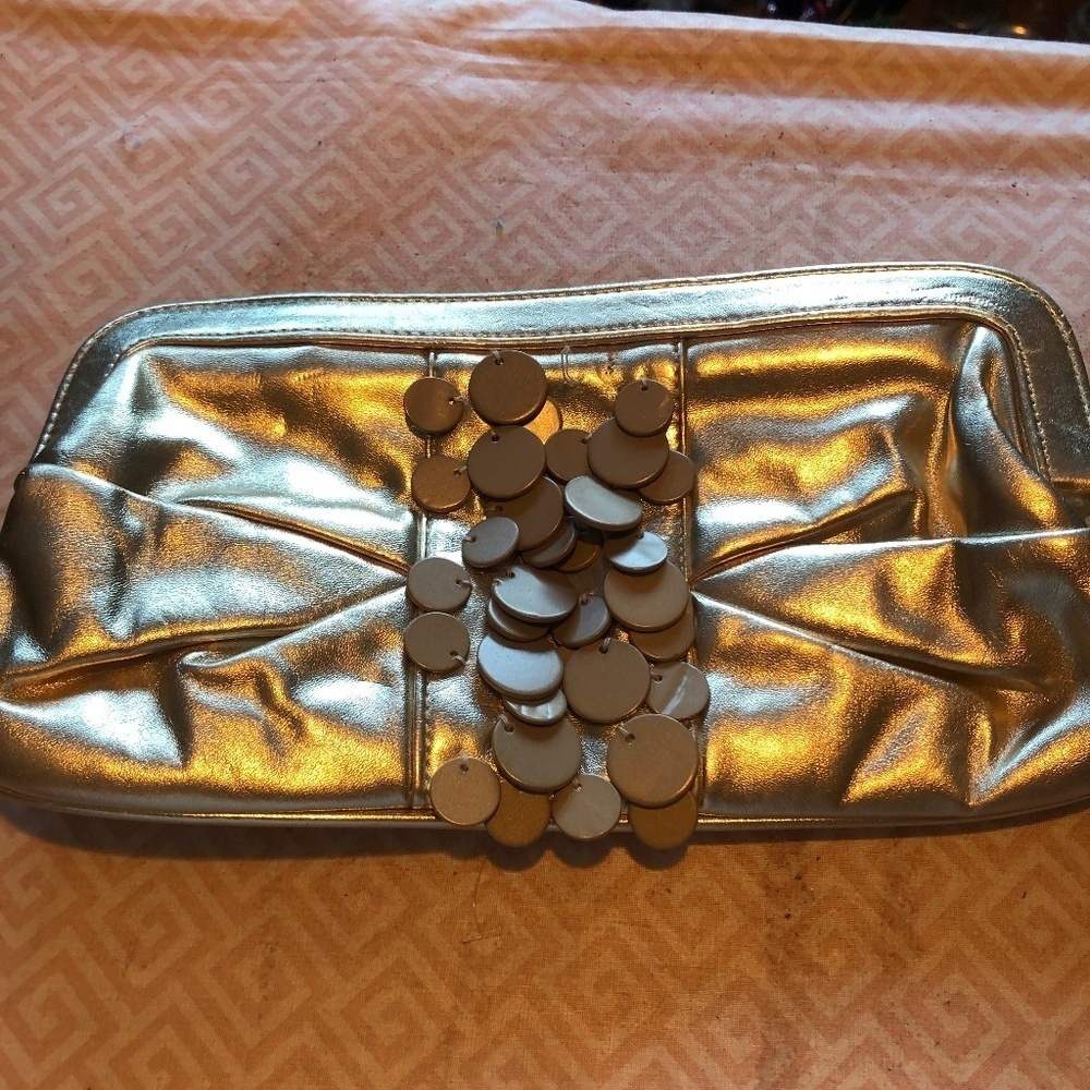 Funky gold Rinaldi clutch, snap shit, clean inside, great for graduation